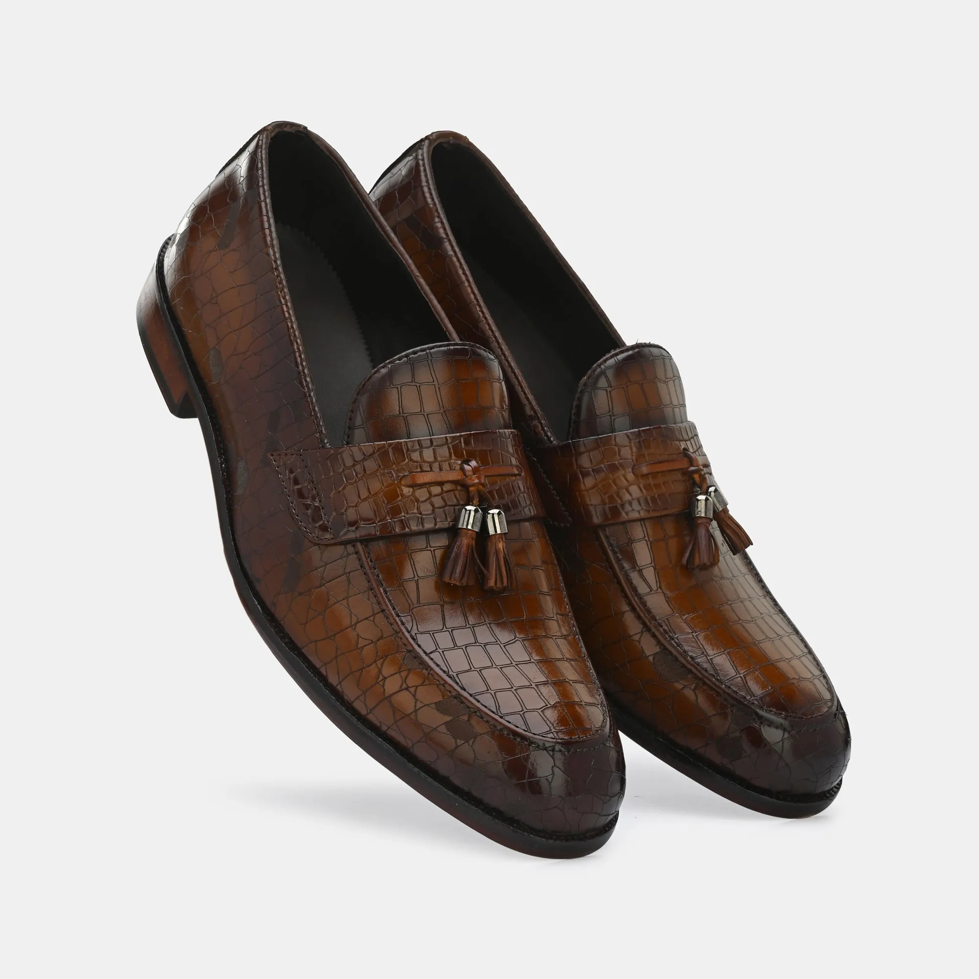 Tan Laser Engraved Tassel Loafers by Lafattio